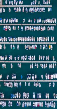 Aerial shot of boats docked in Split, Croatia. Vibrant display of watercrafts in a marina.