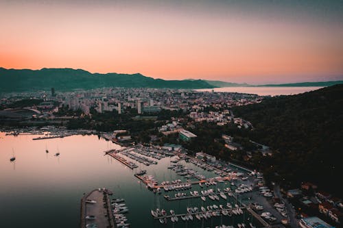 Aerial View of City Buildings Near Body of Water