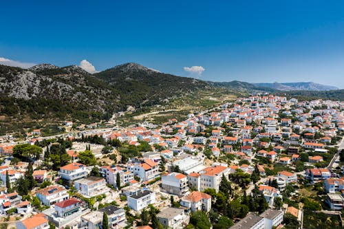 Aerial View of City Near Mountain