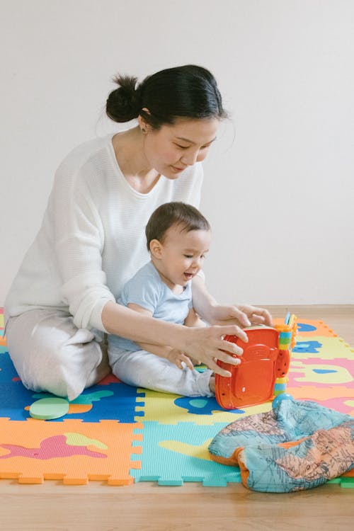 Free Mother and Baby Playing Together Stock Photo