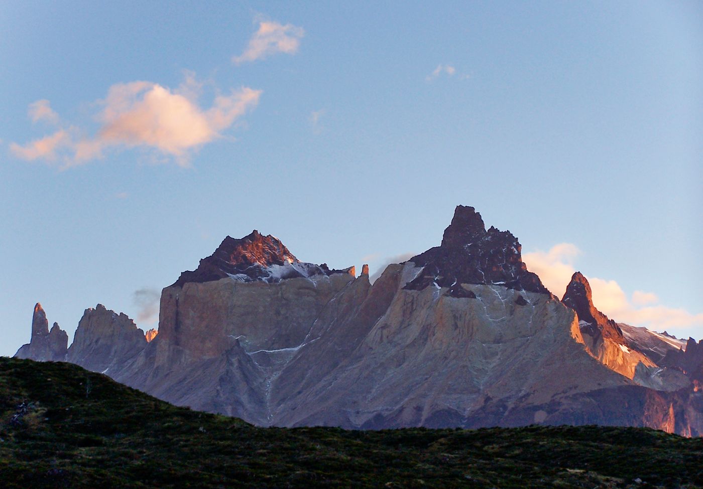 The Torres del Paine massif in Chilean Patagonia at sunrise under a blue sky