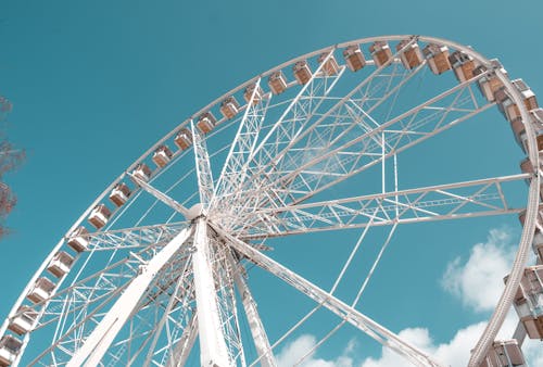 Low-Angle Shot of a White Ferris Wheel
