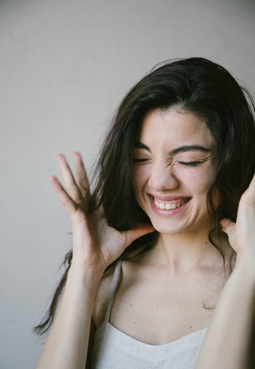 Free Close-Up Shot of a Happy Woman  Stock Photo