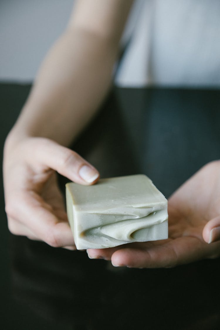 A Person Holding A Soap Bar