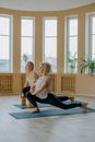 A Fit Couple in a Runner's Lunge Pose
