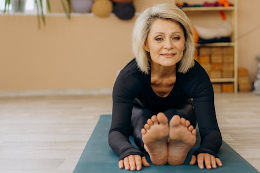 Elderly woman doing yoga indoors, promoting wellness and positive aging.