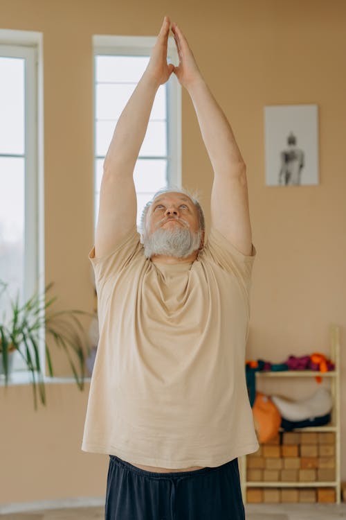 Elderly Man Doing Yoga