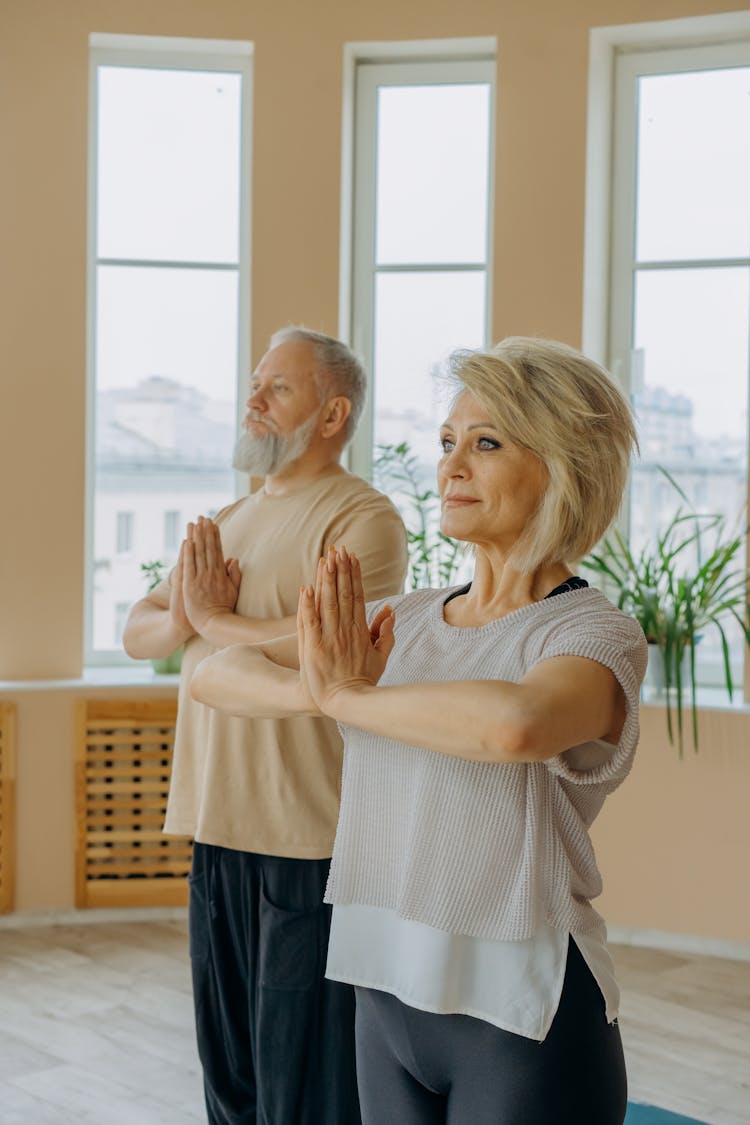 Elderly Couple Meditating