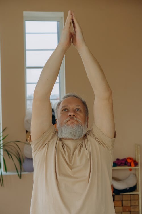 Elderly Man Doing Yoga