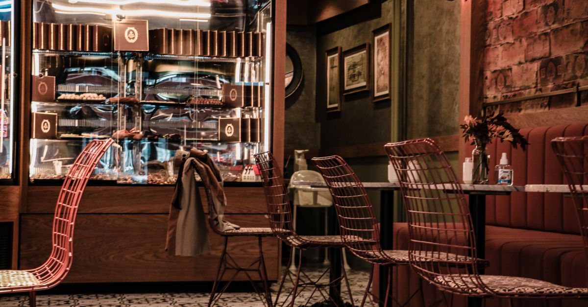 Table Inside Cafe Chairs and Tables Inside a Café · Free Stock Photo