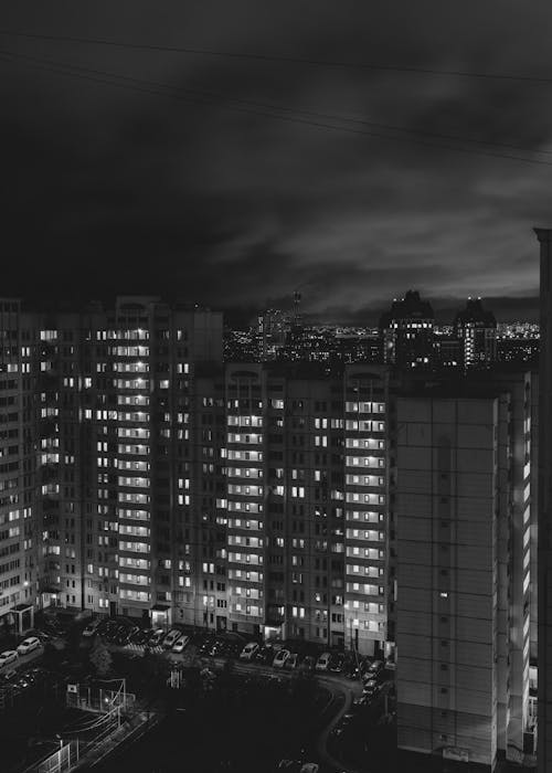 Grayscale Photo of High-Rise Buildings