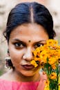 Indian woman with bright flowers