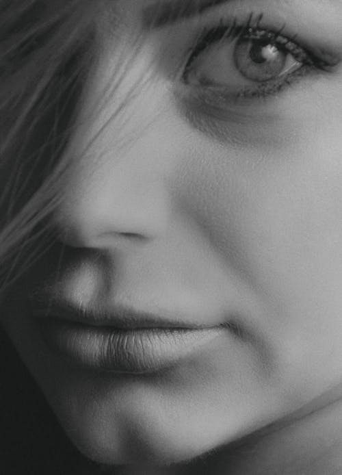 Grayscale Photo of Woman's Face