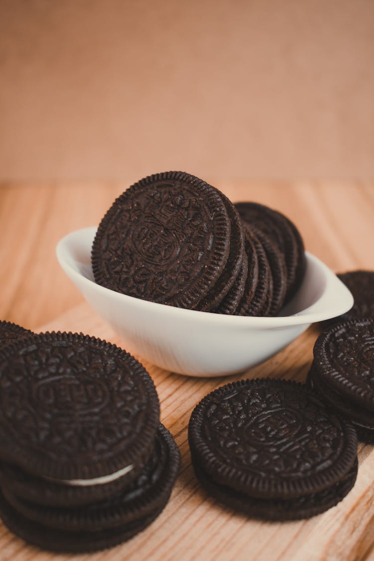 Close-Up Shot Of Oreo Cookies On Wooden Surface