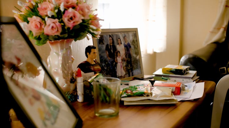 Family Photograph In Frame On Table