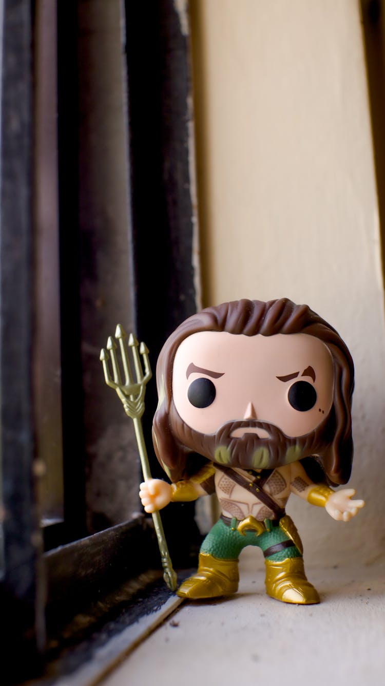 A Funko Pop Toy Of Aquaman