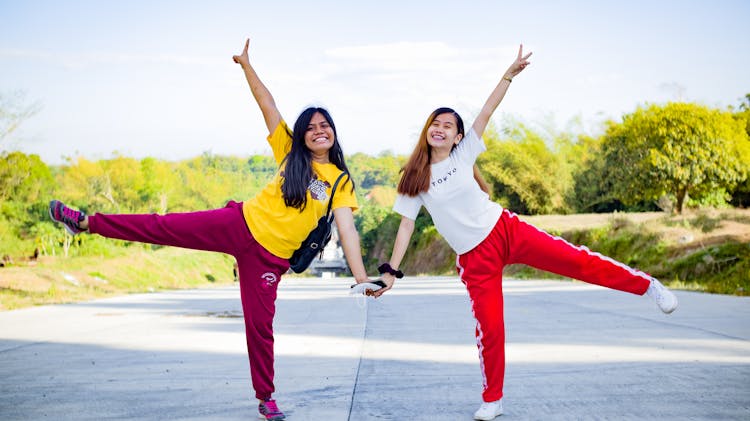 Cheerful Diverse Sportswomen Having Fun In Park