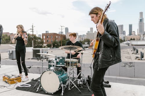 Free A Band Performing on the Roof Top Stock Photo