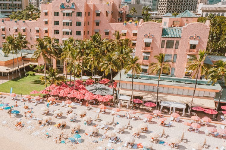 People On The Beach Near The Royal Hawaiian Resort