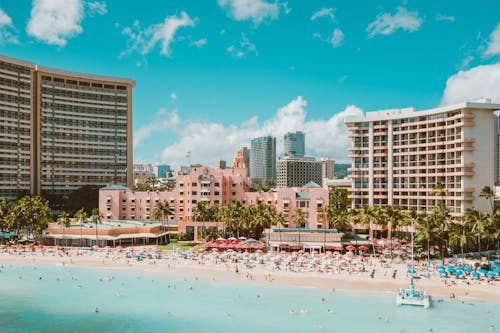 People on Beach in City