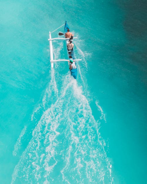 Foto profissional grátis de água azul-turquesa, barco, passeio de barco