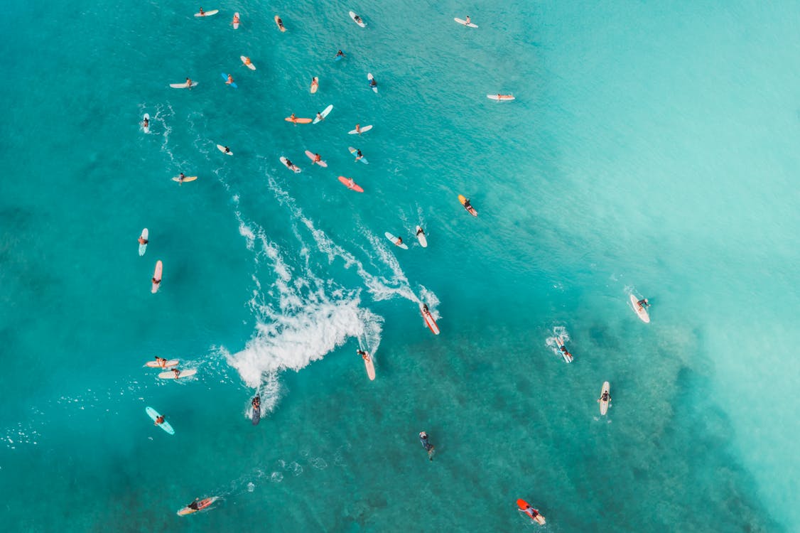 Aerial Photography of People Surfing · Free Stock Photo