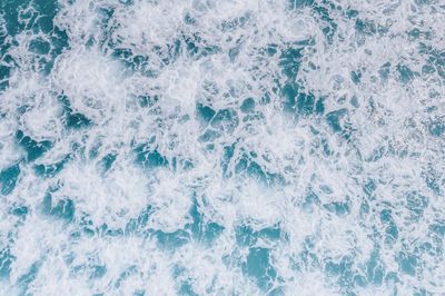 Aerial view of surf on a shoreline — Jess Loiterton on Pexels