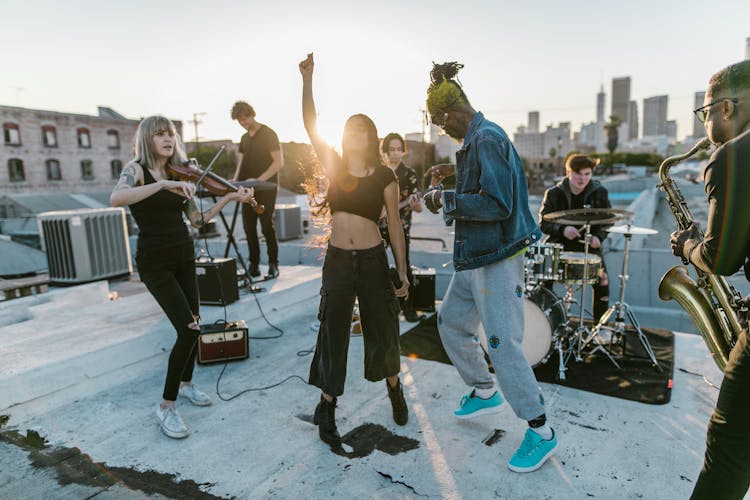 A Band Playing Music On The Rooftop