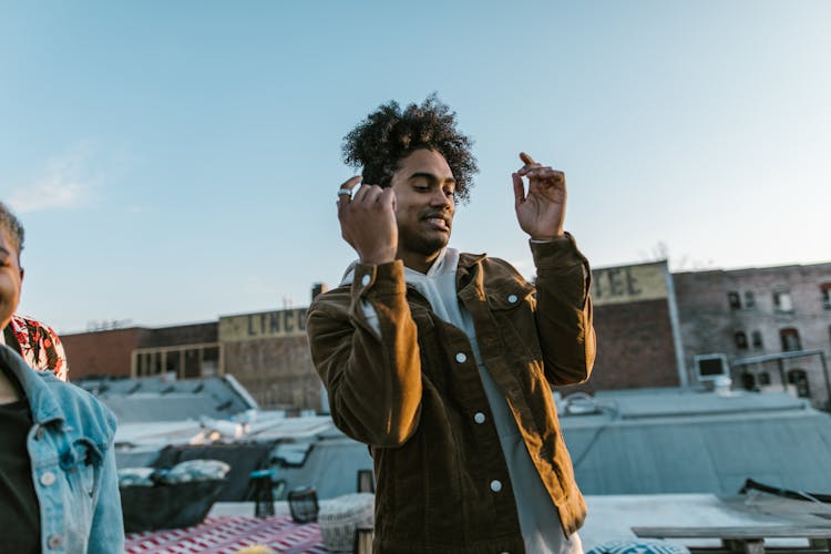 Groovy Man Wearing Brown Jacket 