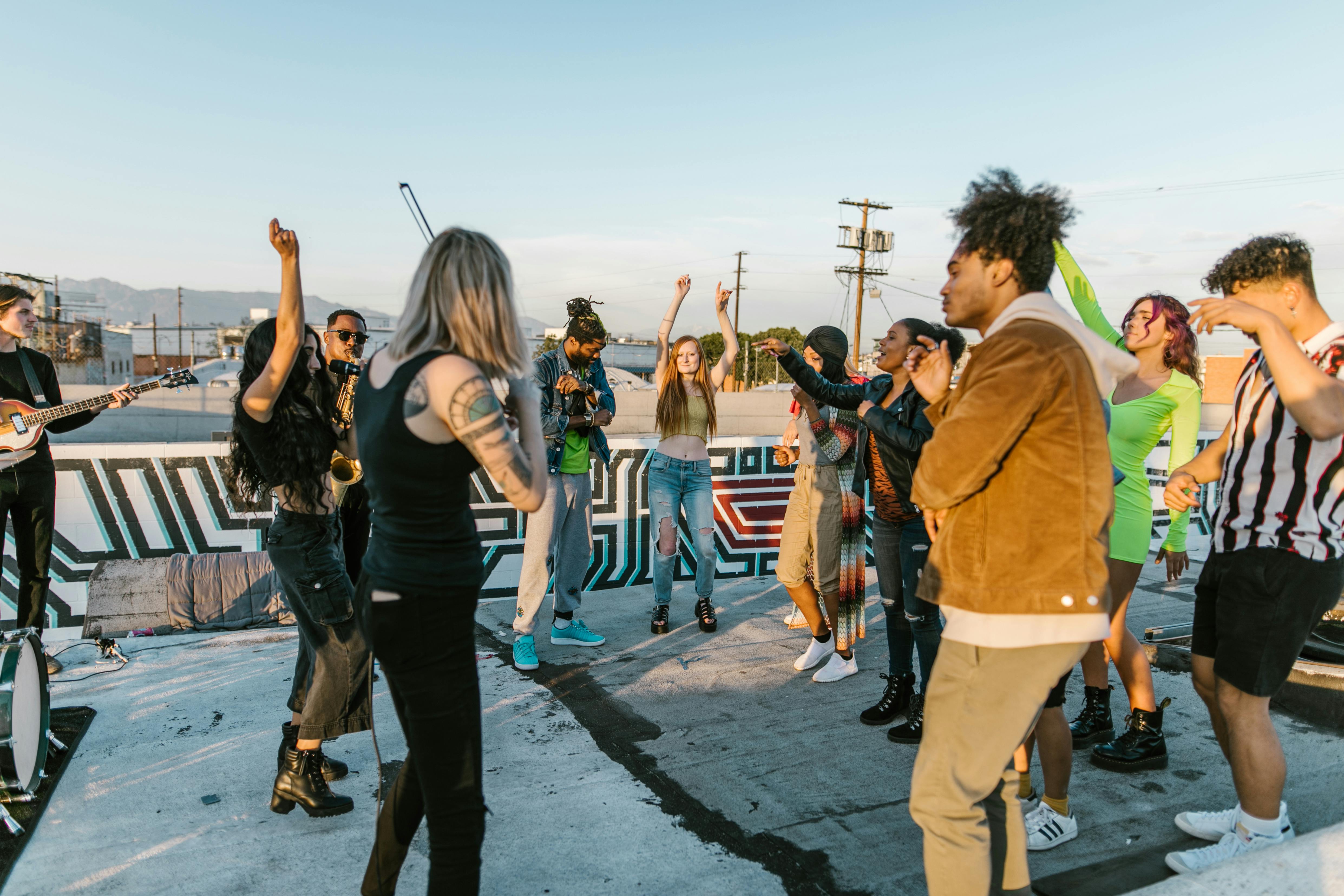 people standing on gray concrete pavement