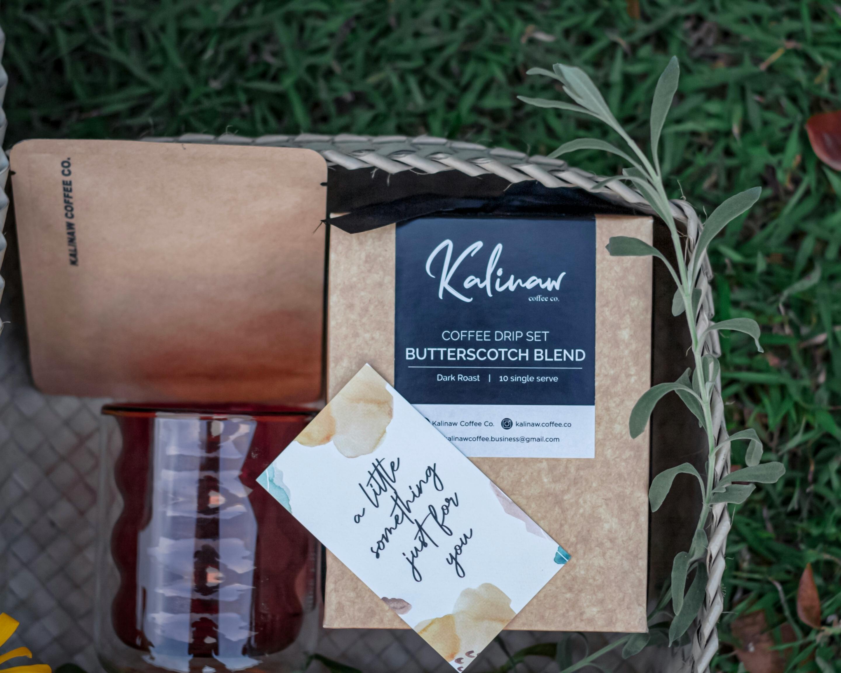 Package with Coffee and Coffee Making Items · Free Stock Photo