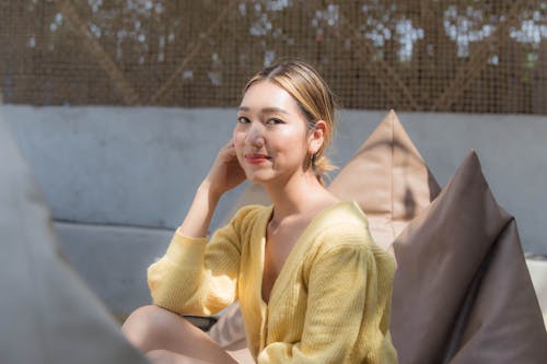 Woman in Yellow Cardigan