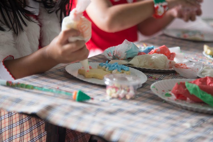 Child Decorating Xmas Cookies