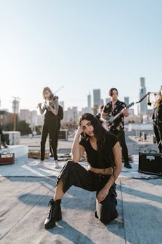 A band performs live on a rooftop with a city skyline backdrop, featuring various instruments.