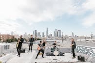 Music Band Playing on the Rooftop