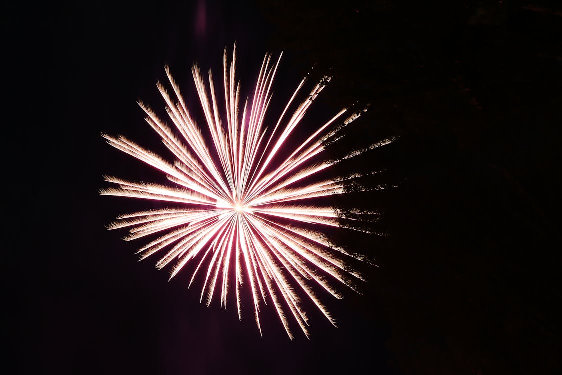 A White Fireworks Display on a Dark Night Sky