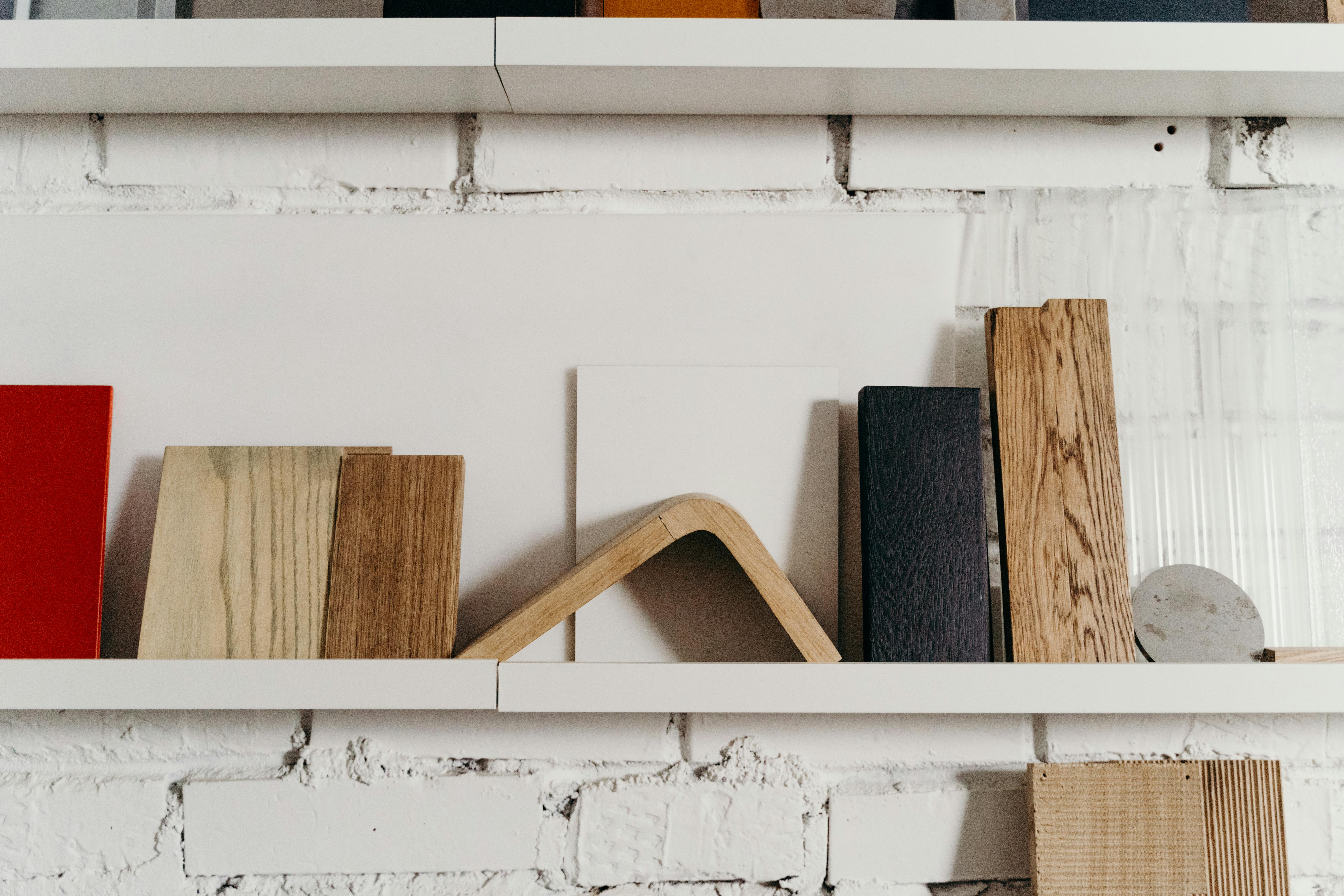 Brown Wood Planks on White Shelf · Free Stock Photo
