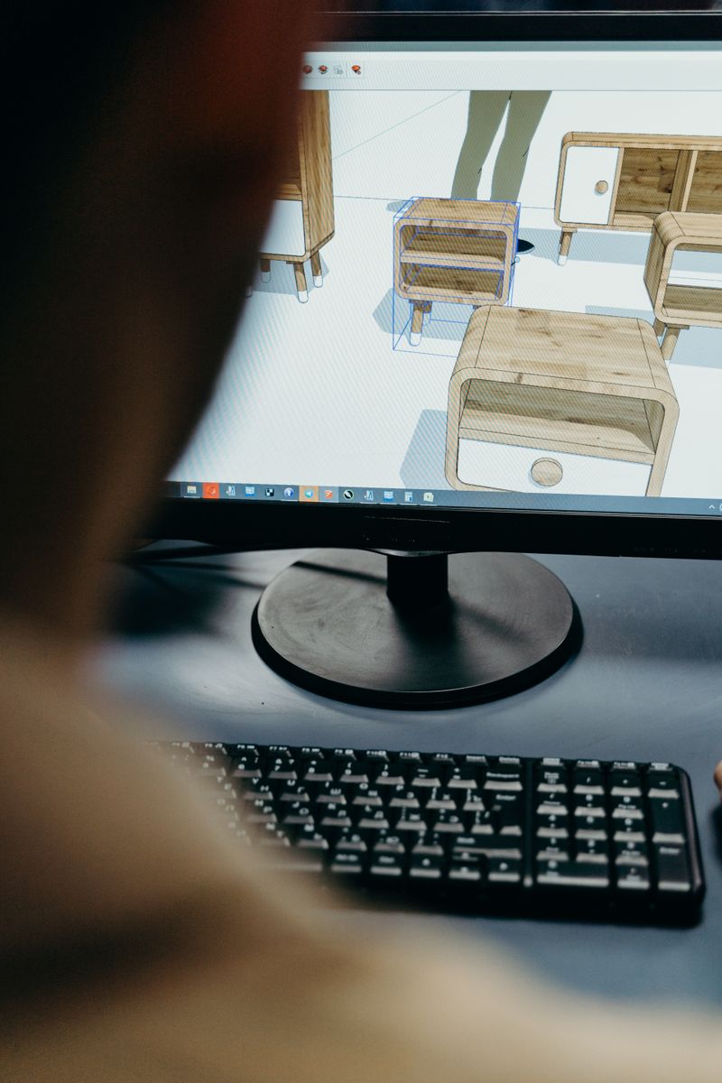 Close-up of digital furniture design on a computer monitor
