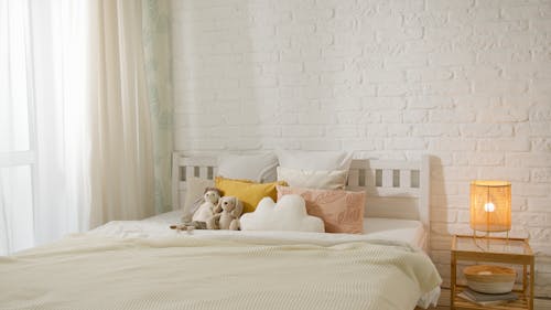 Stuffed Toys on the Bed