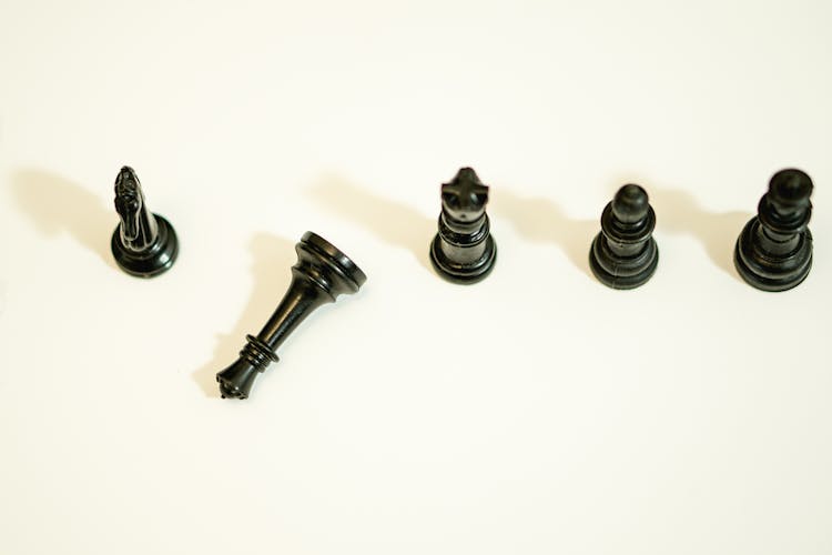 Overhead Shot Of Black Chess Pieces