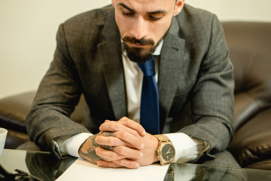 business owner contemplating decision crossroads