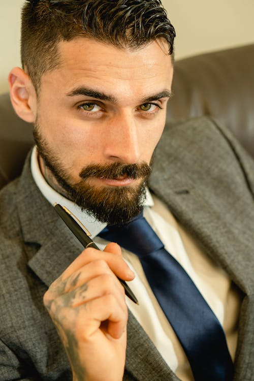 Free Close Up Photo of Handsome Man in Gray Suit Stock Photo