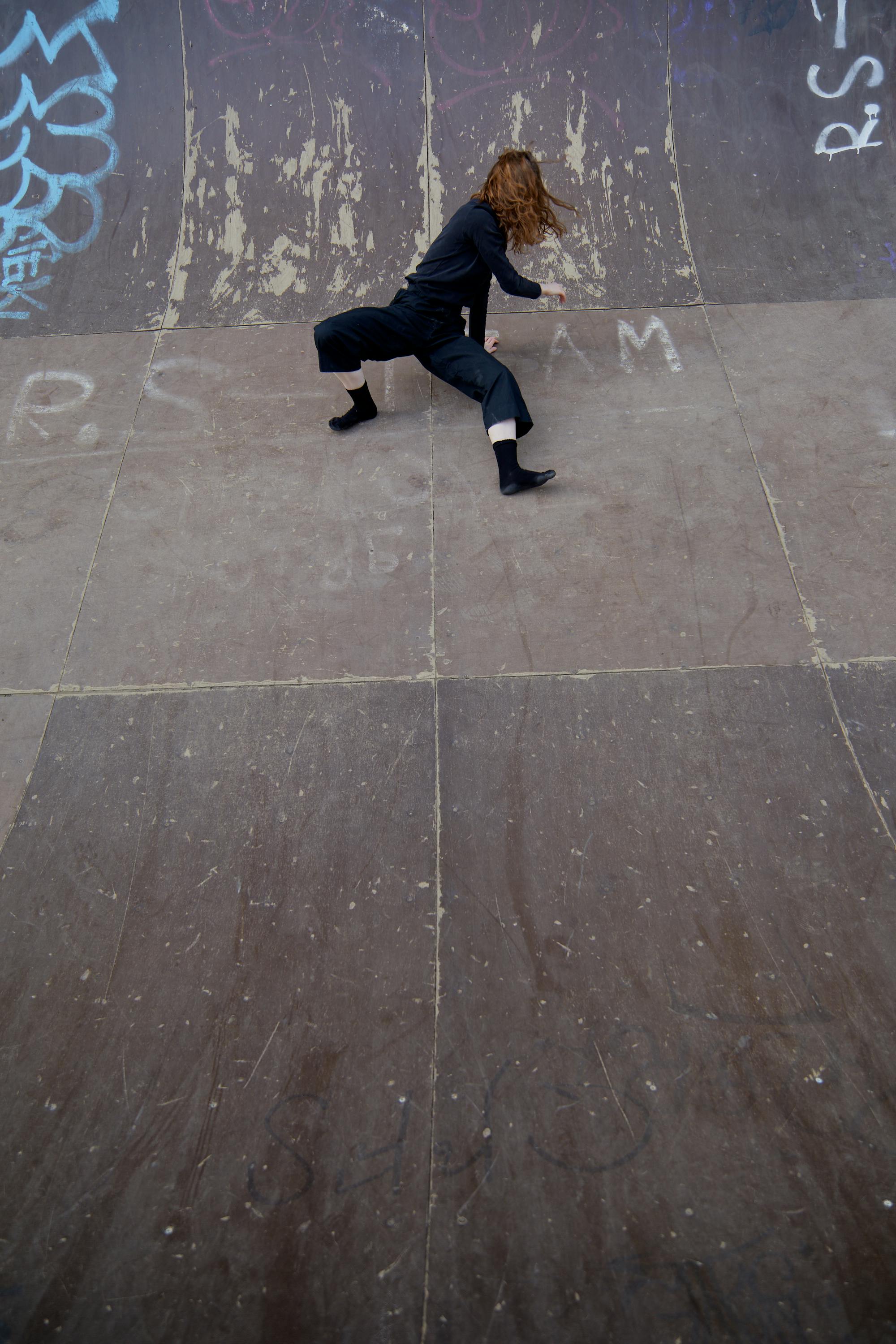 Person Dancing while on Concrete Surface · Free Stock Photo