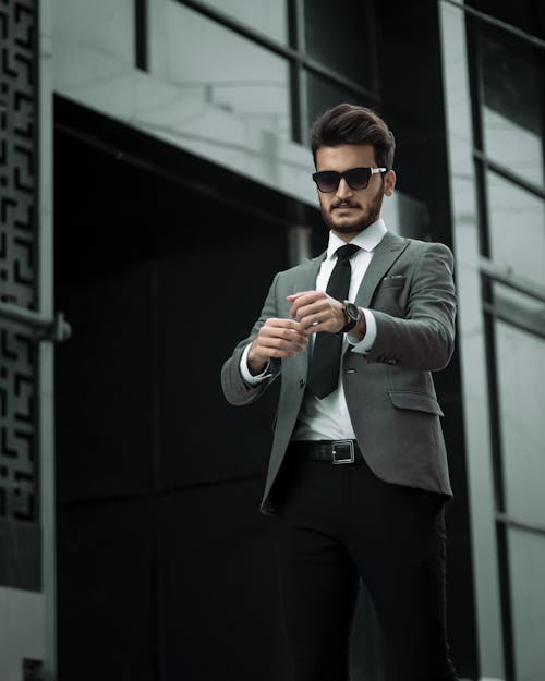 Man in Gray Suit Wearing Sunglasses