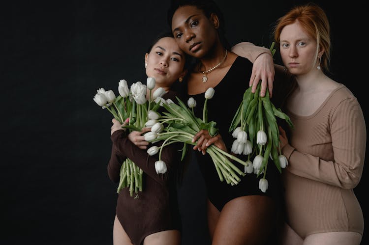 Women With White Tulips