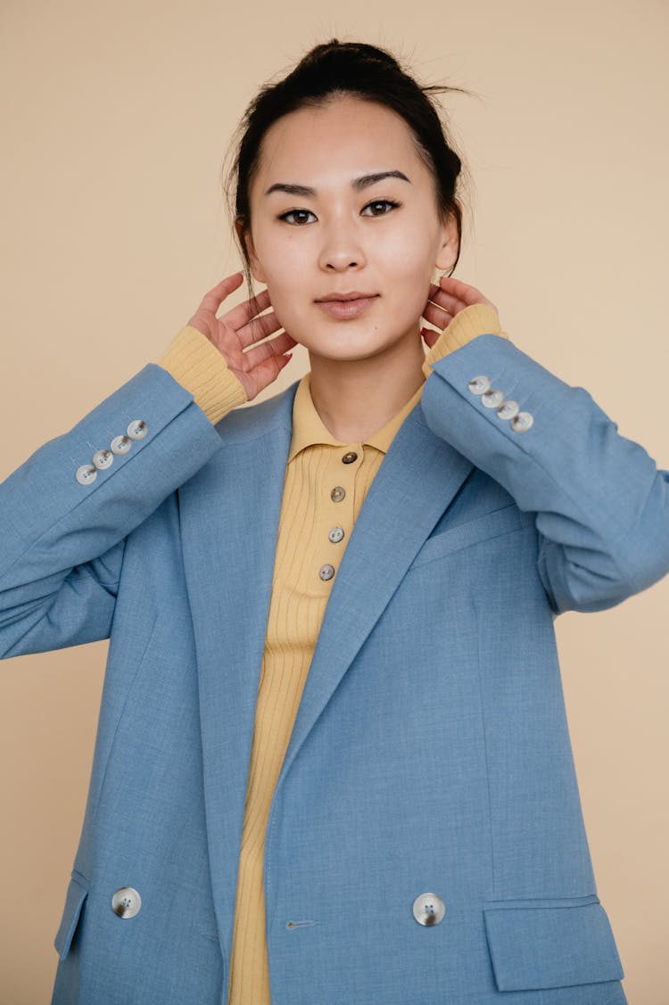 Portrait Of A Woman Wearing A Blue Jacket