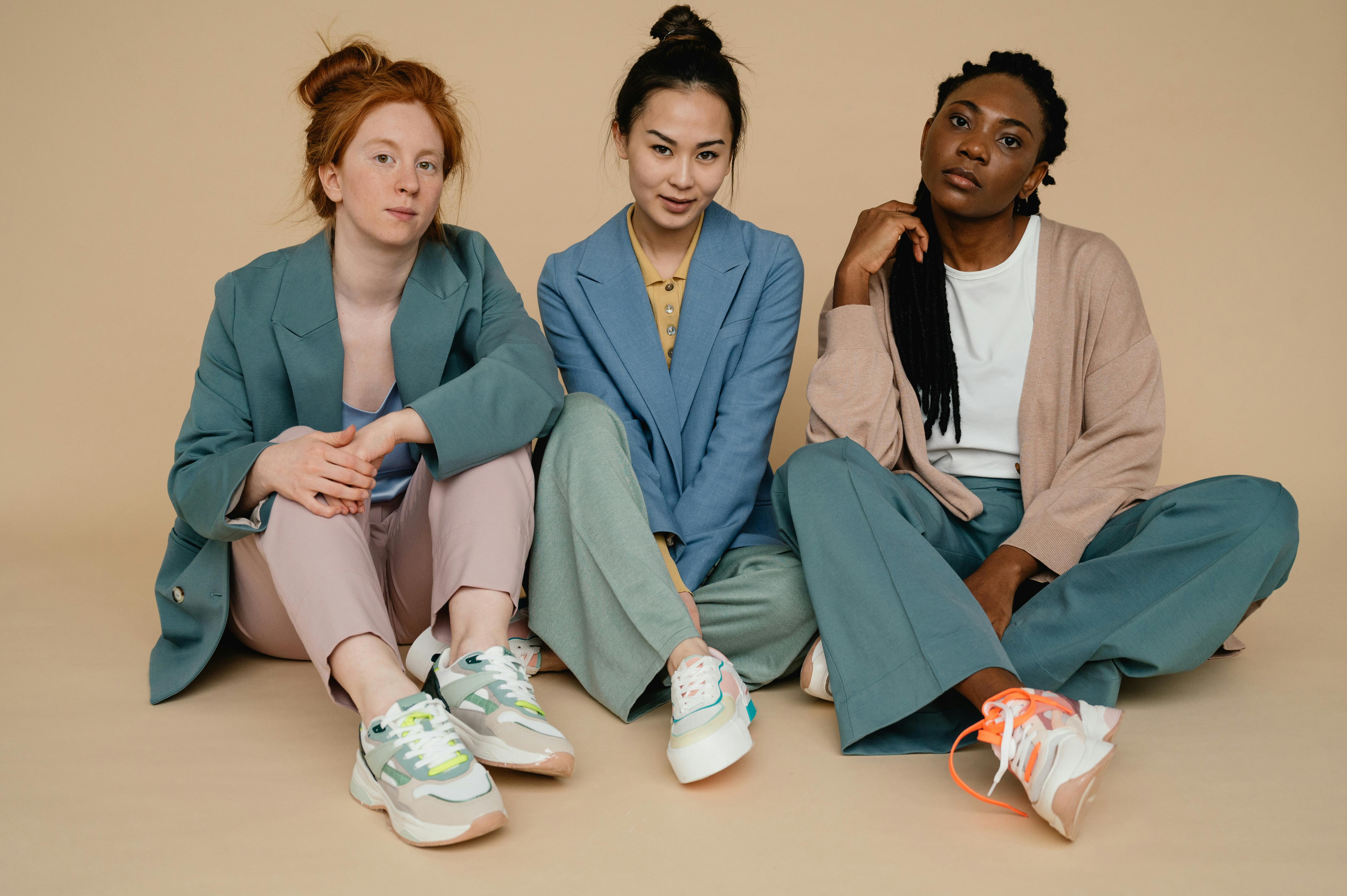 women sitting together on the floor