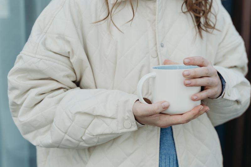 ceramic coffee mug printed with a funny office phrase