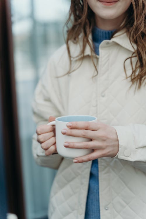 Woman Holding Ceramic Mug