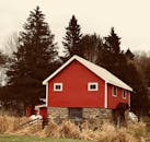 Red, Brown, and White Wooden and Brick House